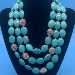 Heidi Daus turquoise color with clear Swarovski crystal beads necklace.